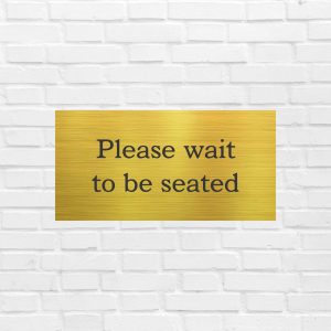 Please Wait to Be Seated Sign