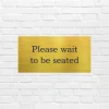 Please Wait to Be Seated Sign